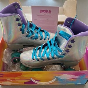 Impala Roller skates NWT. Womens size 8 Holographic color and never been used.